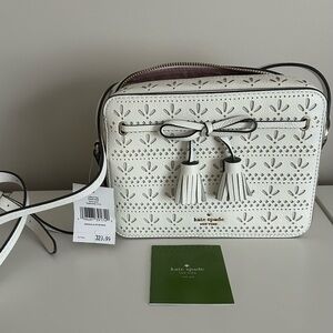 Kate Spade White Crossbody Bag with Geometric Pattern and Tassels